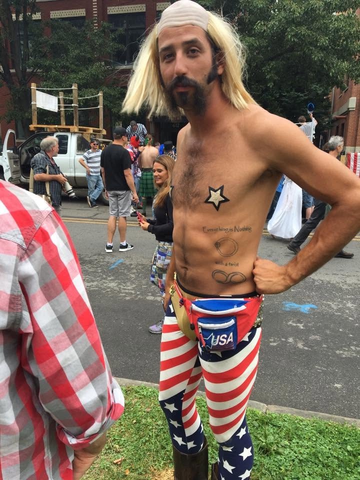 Andy Porter wearing patriotic pants and a blond wig